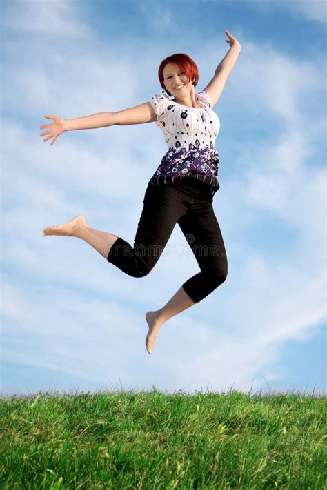 jumping woman stock image image  clouds jump freedom