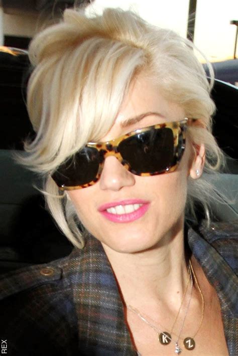 mid length tousled platinum blonde up do with leopard print shade is there anyone cooler than