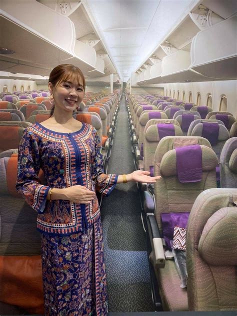flight attendant uniform singapore airlines cabin crew glass design
