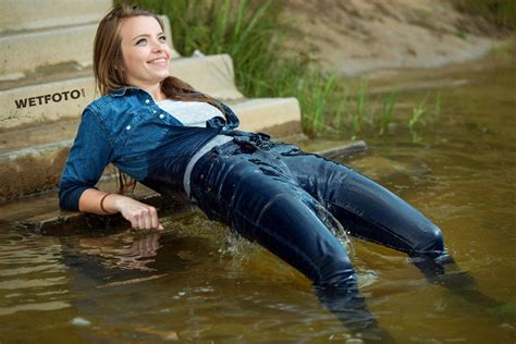 Pin On Wetlook By Smiling Girl In Wet Tight Jeans And Gray T Shirt