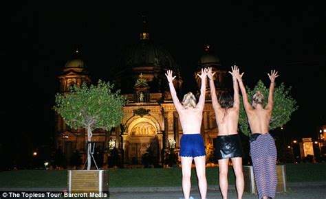 travellers spark internet craze with topless tour around the world