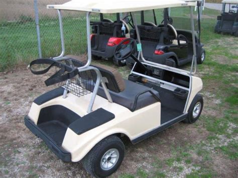 club car ds  beige wcharger    custom golf carts parts  rentals