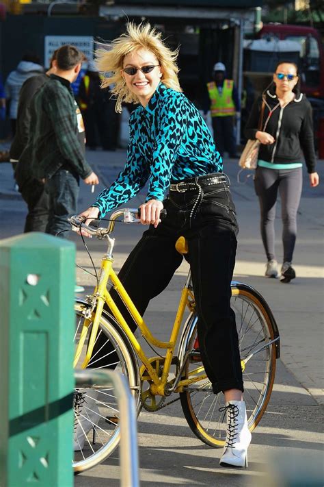 gigi hadid sports a blonde frizzy look during a photoshoot