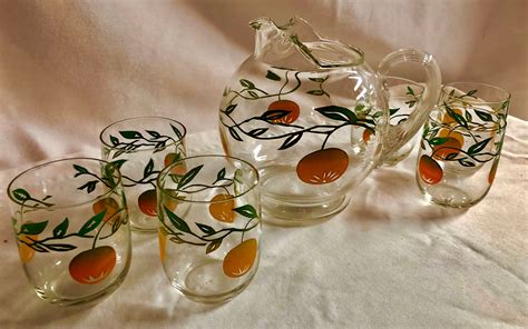 vintage midcentury glass orange juice pitcher  set   juice glasses