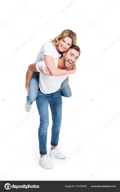 excitado hombre piggybacking novia aislado blanco fotografia de stock  igorvetushko