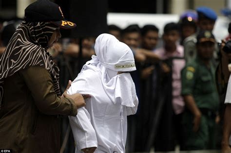 indonesians lashed for breaking sharia law daily mail online