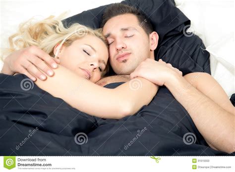 affectionate couple enjoying a blissful sleep stock image image of entwined cuddling 31515553