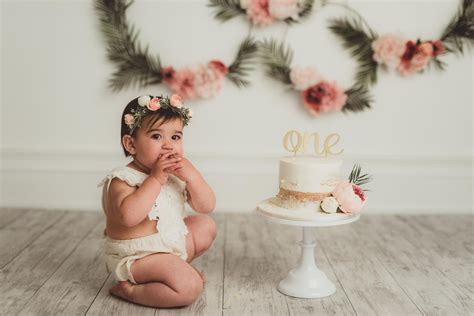 Ally S First Birthday Cake Smash With Pink Floral And Palm Hoops