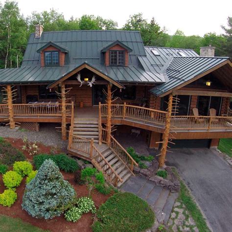 meadow lodge  luxury log cabin  waterbury vermont sits