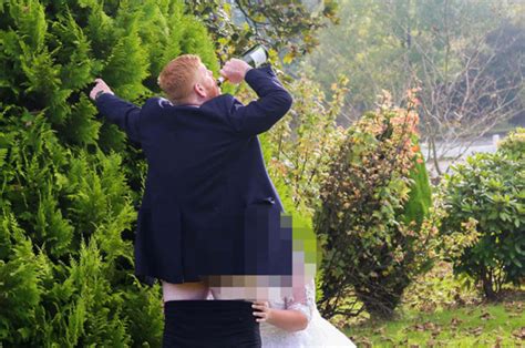 Couple Perform Oral Sex Act During Wedding Photoshoot