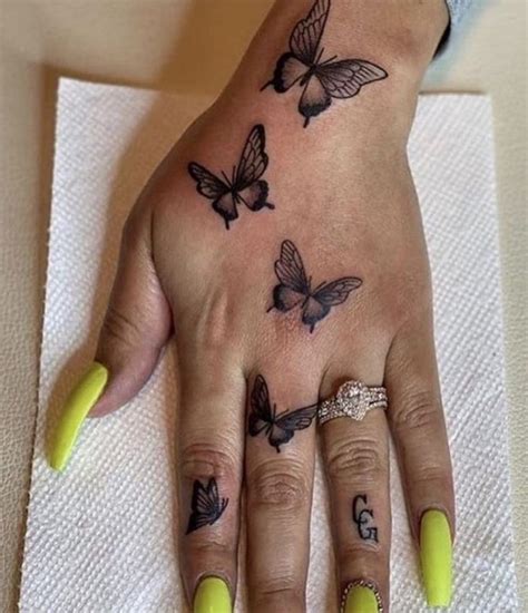 pin  aubreygrace           hand tattoos butterfly hand tattoo pretty