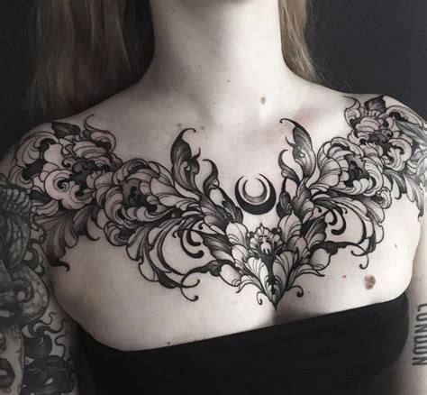 incredible black  grey chest piece tattoo  france  dorothy