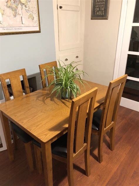 wooden  seater dining table  matching chairs  hessle east