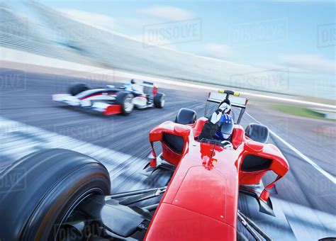 formula  race car crossing finish   sports track stock photo
