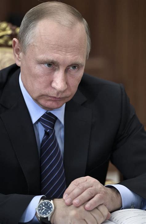 President Vladimir Putin Denies Russia Uses Hackers