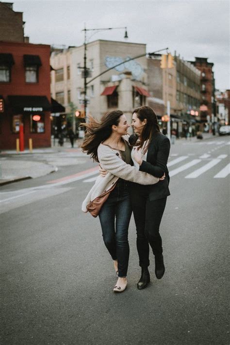 a surprise proposal on a nyc rooftop lesbian couples photography