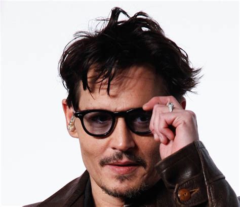 johnny depp confirms engagement to amber heard… by showing