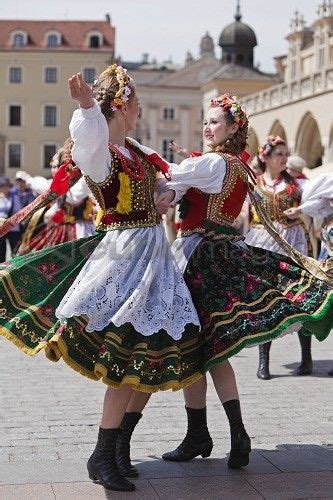 poland cracow polish girls in traditional dress dancing in market