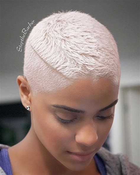 platinum blonde hair on black woman tapered short haircut with a disconnected side part