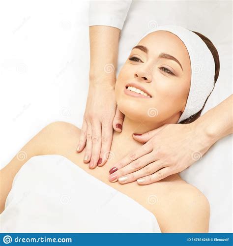 facial salon massage woman professional therapy hands at