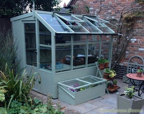 swallow jay  wooden potting shed greenhouse stores