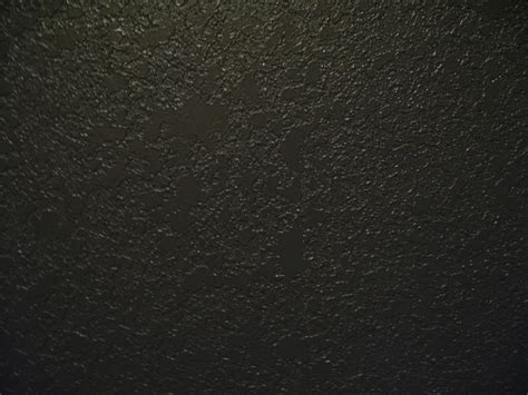 black paint plaster interior wall grunge texture