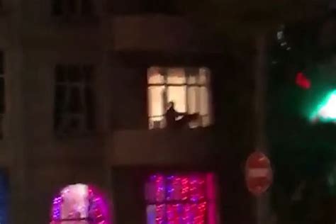 naked couple put on live sex show for passersby from their hotel balcony world news mirror