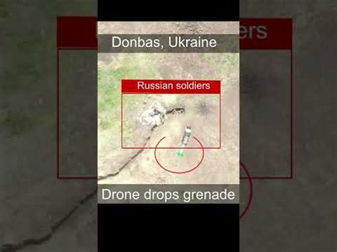 ukrainian drone drops grenade  russian soldiers youtube