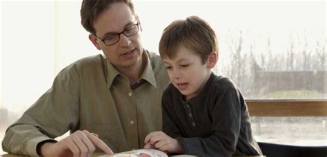 father teach  son aan tafel helsinki