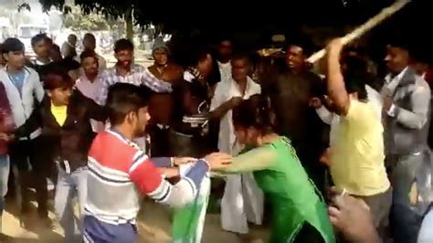 woman beaten with stick in india for resisting sexual assault video