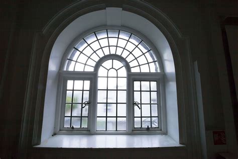 arched windows  replacement window costs modernize