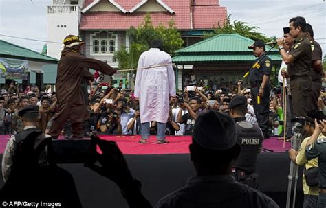 two gay men face 100 lashes in indonesia daily mail online