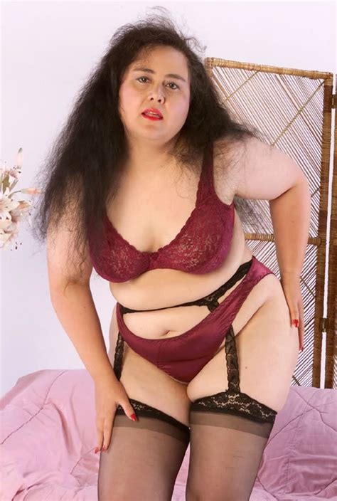 classy brunette kathy lady poses seductively in very sexy black stockings viva bbw