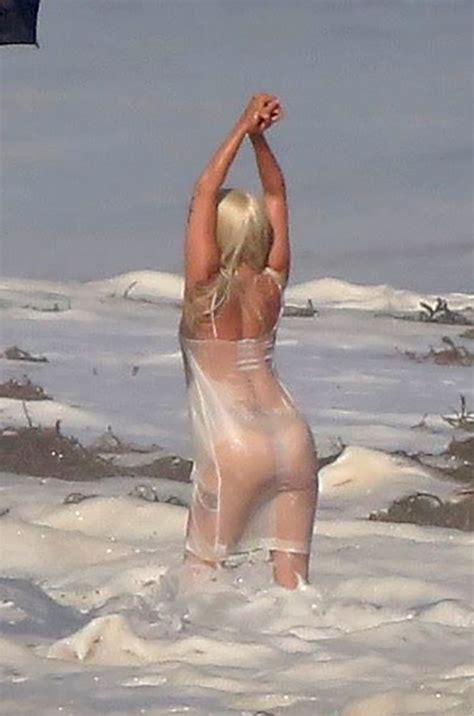 A Wet Lady Gaga At The Beach Hot See Through Ass And Tits
