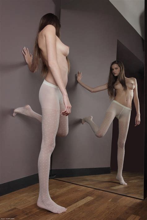 long legged topless silvie deluxe with sexy tits poses in white pantyhose in the mirror