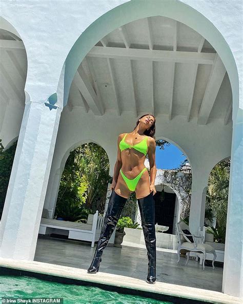Irina Shayk Puts On A Leggy Display In Thigh High Boots And Neon Green
