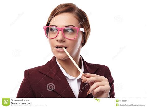 sexy teacher holding a pen in the mouth and wearing nerd