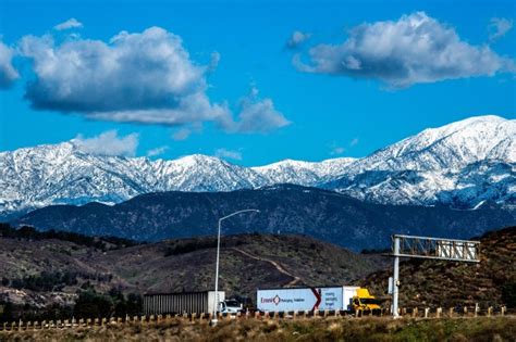snow capped mountains create stunning inland area backdrop