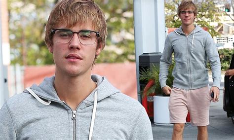 justin bieber steps out with his famous floppy bangs daily mail online