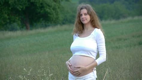 hd1080 7 months pregnant woman outdoor in nature stock