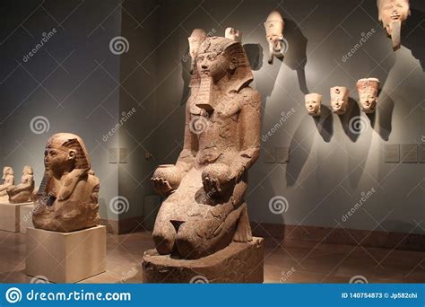 artifacts and statues from ancient egypt at the metropolitan museum of