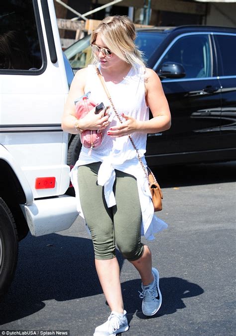 hilary duff takes her son luca out to decorate sweet