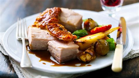 Roast Belly Of Pork With Root Vegetables Recipe Bbc Food