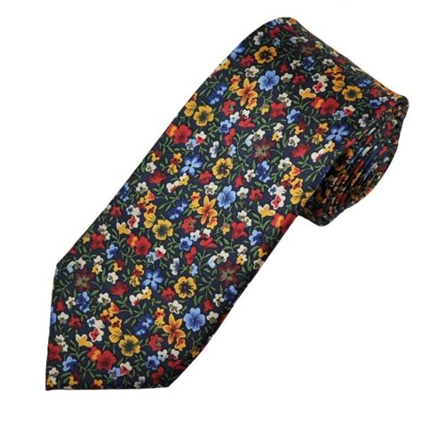 navy and multi coloured flower patterned men s silk tie from ties planet uk