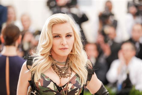 madonna teases release    song   years