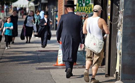 hasidic jews in heavy dress bear up in summer the new york times