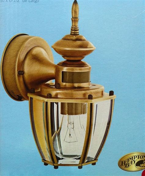 hampton bay exterior motion sensor wall lantern light antique brass finish amazonca electronics