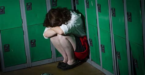 school bully forces girl to get down on her knees and eat rubbish