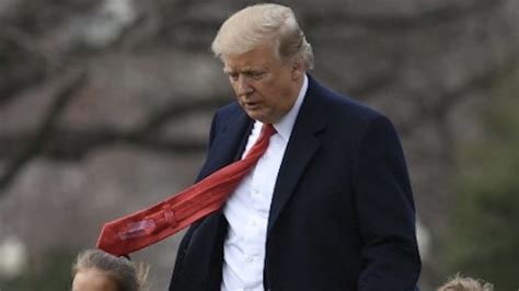 Trump Tapes His Tie Together Which Is A Metaphor For His Presidency