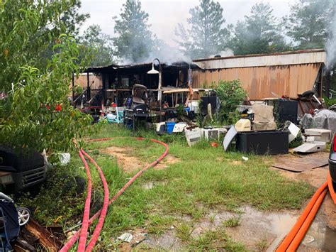 fire breaks   mossy head mobile home firefighters knock  flames walton county